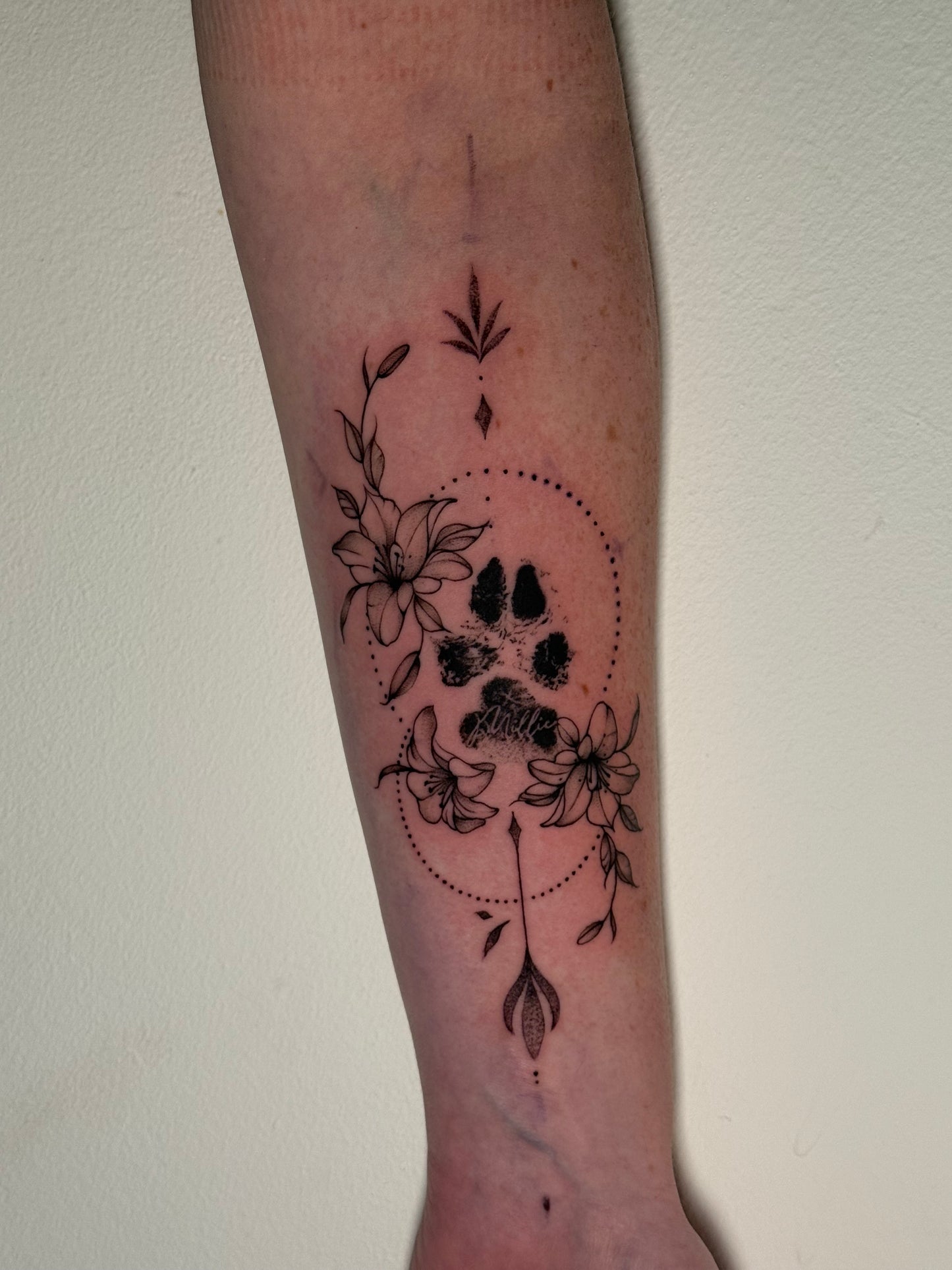 Black floral tattoo