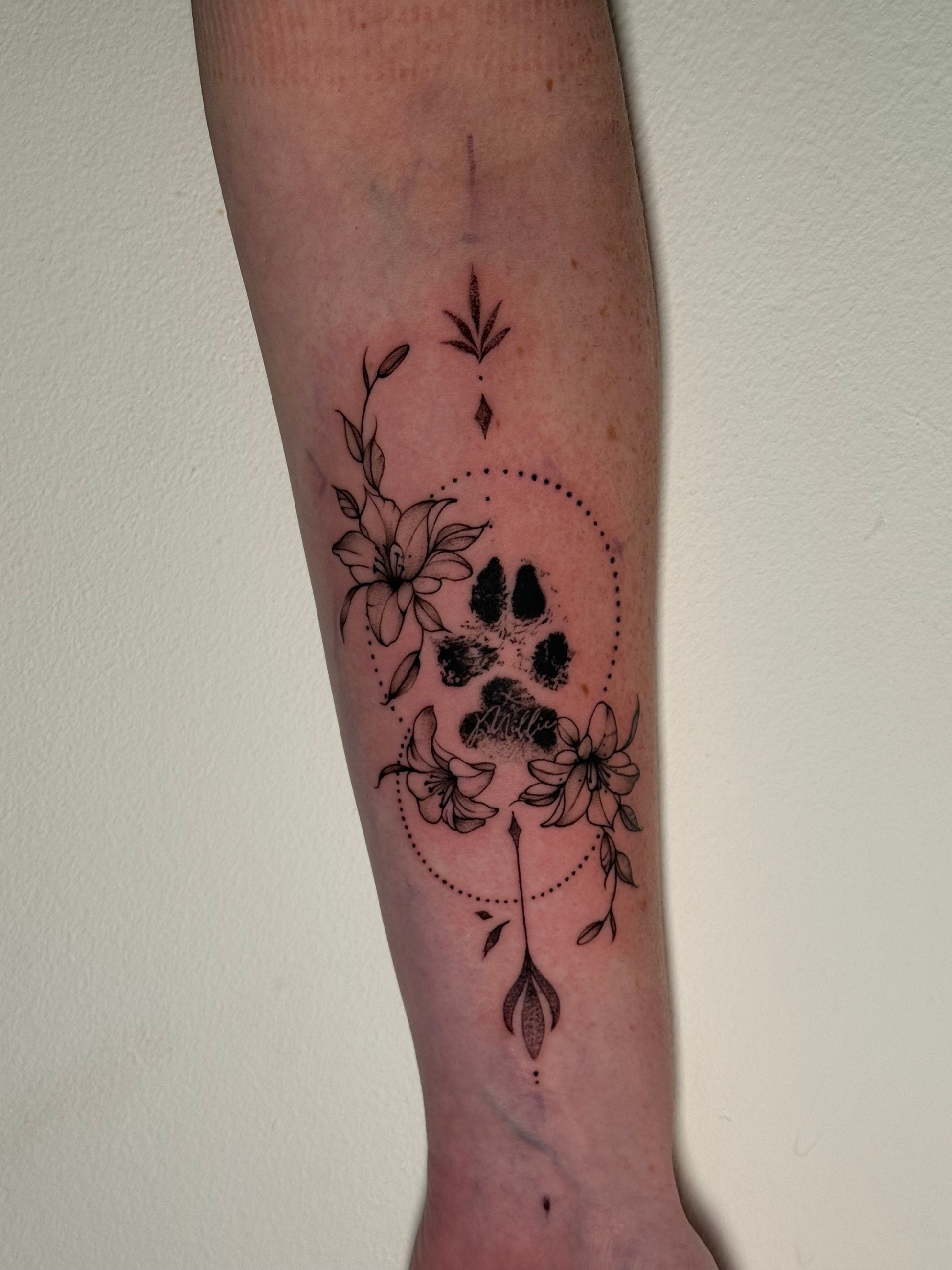 Black floral tattoo